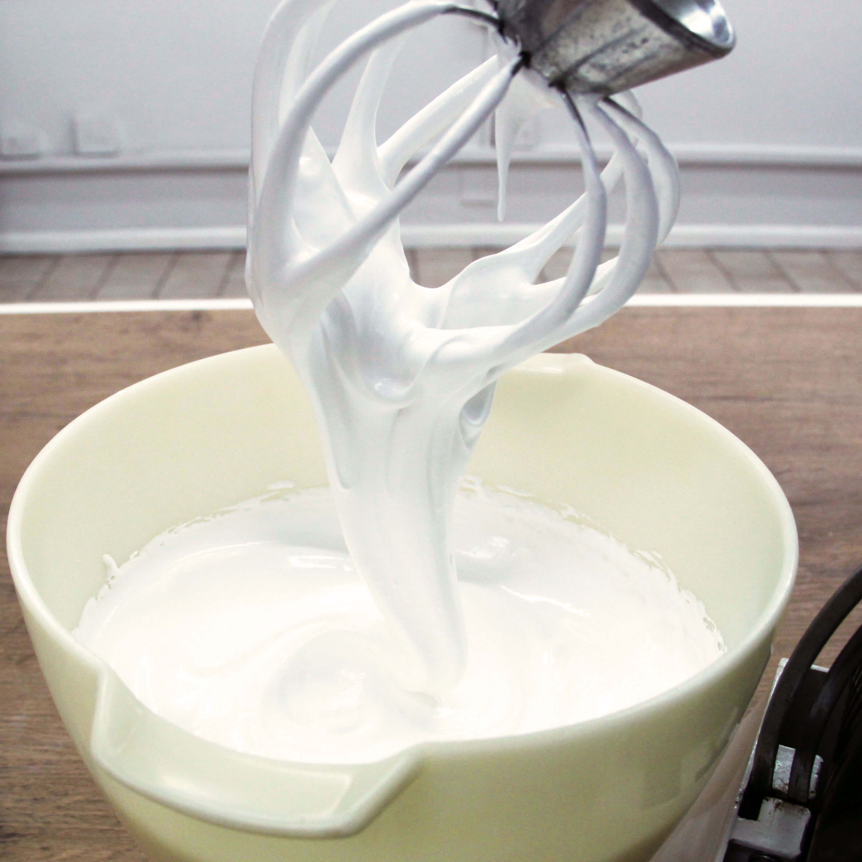 Mixing machine running through marshmellow mixture